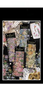 Macro view of Dazzling Flowers PET stickers with vintage floral motifs and gold foil details