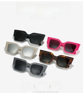 Detailed display of five colorful square sunglasses in durable chunky frame design