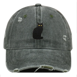 Distressed washed cotton baseball cap with black cat embroidery and ripped vintage design