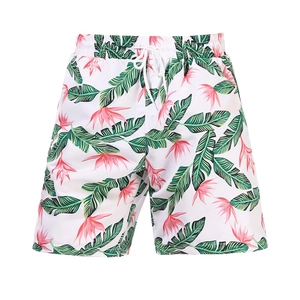 Détail du maillot de bain homme à fleurs tropicales avec cordon et taille élastique