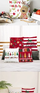 Detailed view of red and black plaid Christmas pillow covers with reindeer and trees