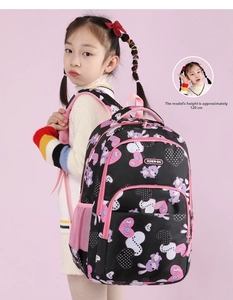 Pink and black girl backpack worn by a 120cm child model showing ergonomic size and design