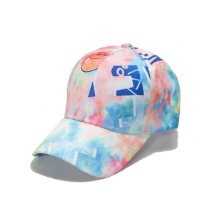 Tie-dye cotton baseball cap with colorful graffiti letters and orange smiley face print