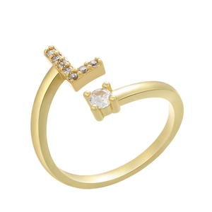 Detailed view of open gold ring featuring letter L paved with zircon and a round crystal