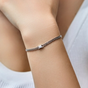 Elegant S925 sterling silver chain bracelet with emerald-cut clear cubic zirconia on wrist