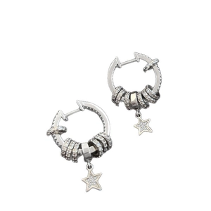 Minimalist silver star tassel earrings with white zircon pavé in a sleek ring design