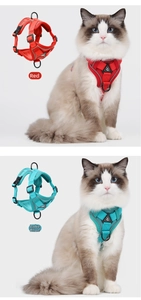 Detail of breathable mesh cat harness with reflective straps in red and lake blue colors