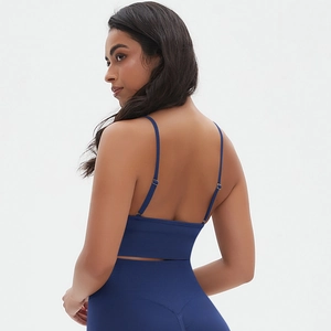 Seamless dark blue sports set with strappy yoga tank top and high waist leggings