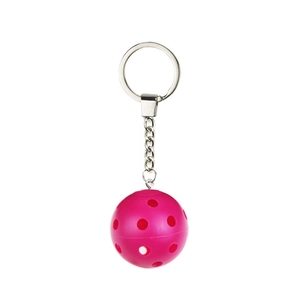 Detailed view of pink pickleball keychain featuring a hollow plastic ball and silver ring