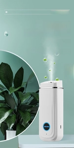 Wall-mounted smart aroma diffuser in white with LED indicator and fine mist spray nozzle