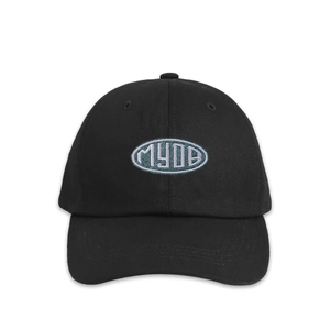 Detailed view of black MYOB letter embroidery on high-quality cotton baseball cap fabric