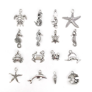 Detailed grid of 16 silver ocean-themed metal pendants including turtles and seahorses