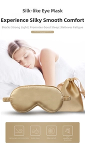 Detailed view of golden silk sleep mask set including a matching drawstring storage pouch