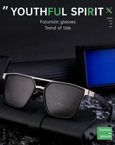 Close-up of stylish black frame sunglasses with silver bridge on leather base