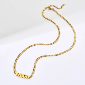 18K gold plated 304 stainless steel Virgo zodiac necklace with Figaro chain on white background