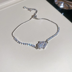 Detail of silver Hamsa Hand bracelet with pave-set zircons and adjustable slider clasp