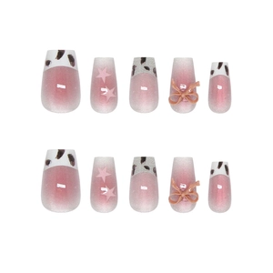 Handmade leopard cat eye press-on nails with 3D resin bows and pink star decorations