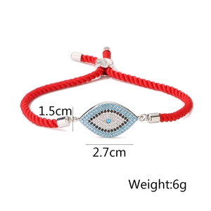 Detailed view of evil eye charm red string bracelet with size and weight specs
