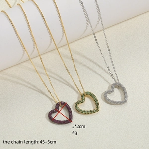 Three minimalist heart pendant necklaces with zircons in magenta, green and white crystal