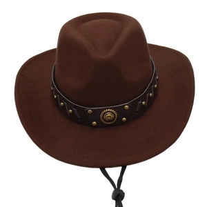 Detail of brown felt cowboy hat featuring leather strap with gold studs and metal buckle