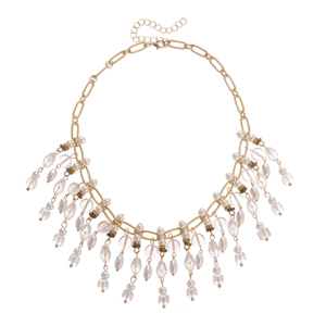 Vintage gold necklace with faux pearls and fringe tassels in a royal court style