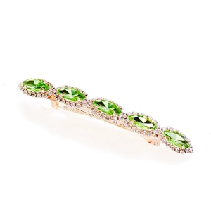Vintage gold hair clip with large green marquise crystals and sparkling rhinestones