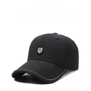 Close-up of quick-dry baseball cap with R logo shield and reflective brim detail