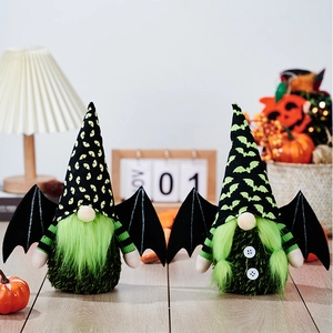Detail of Halloween gnomes with green faux fur beards and black leather bat wings