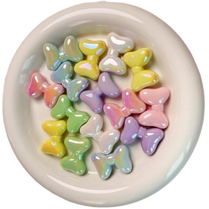 Pastel bow-shaped acrylic beads with iridescent pearl finish for DIY jewelry crafts