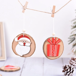 Hanging natural wood ornaments featuring Santa Claus and gift box designs for Christmas