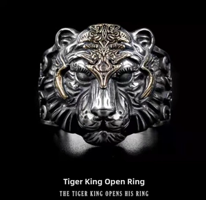 Detailed close-up of a vintage dual-tone tiger head ring with fine engraved texture