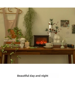 Close-up of LED electric fireplace lamp with realistic flickering flame effect on wood table
