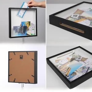 Detail of black shadow box with 5.5 inch top slot for tickets and transparent panel