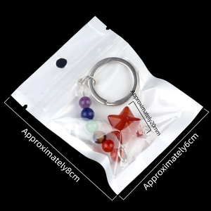 Seven chakra crystal Merkaba star keychain with a red stone pendant and colored beads