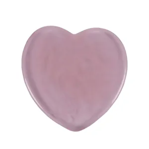 Pink heart-shaped resin massage stone for facial scraping and meridian therapy