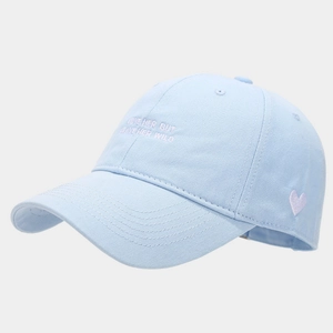 Detail of light blue baseball cap with side heart and purple love embroidery