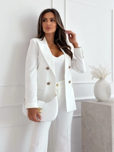 Detail shot of white double-breasted blazer with gold buttons and matching crescent bag