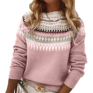 Detail of Fair Isle jacquard pattern on pink crewneck sweater with ribbed cuffs