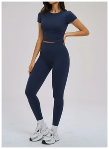 Detail of slim fit navy blue yoga set showing high elasticity fabric and snug fit design