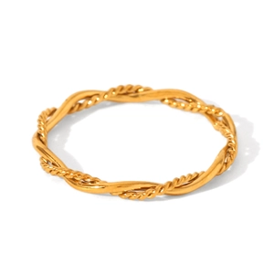 Detailed view of a minimalist golden twisted rope ring with a shiny metallic finish