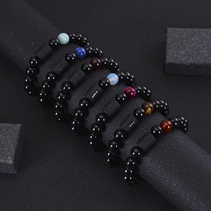 Elastic beaded zodiac bracelets with black onyx, tiger eye stones, and matte metal charms