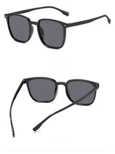 Detailed 45-degree side and back view of black square sunglasses with gold metal accents