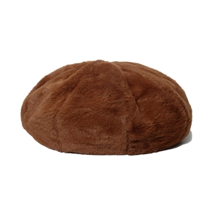 Detailed view of the soft brown faux fur texture on a warm winter beret hat for women
