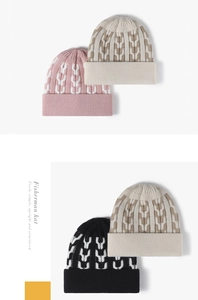 Detailed knit texture and wide folded brim of winter beanies in pink, beige, and black