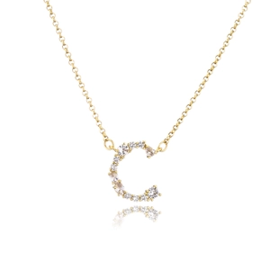 Elegant gold letter C pendant necklace with cubic zirconia paving on a thin chain