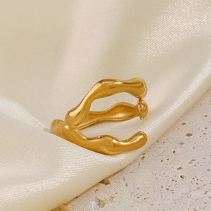 Minimalist 18K gold plated stainless steel irregular lava ring on white silk background