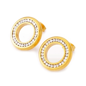 Close-up of golden geometric earrings with double rows of sparkling white zircons