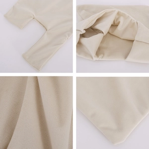 Detail view of beige velvet fabric texture and high-quality inner stitching for wrist bags