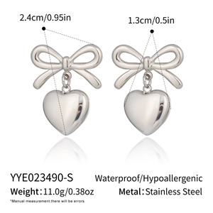 Detail view of waterproof stainless steel bow earrings with heart pendants and dimensions