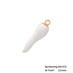 Detailed view of white enamel S-shaped chili pendant with dimensions 21mm by 7mm